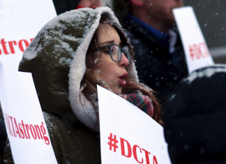 The Latest: Denver teachers get ready to walk out over pay